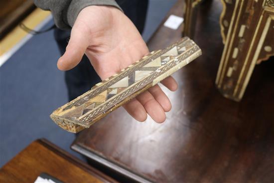 An Ottoman mother of pearl tortoiseshell and bone inlaid table W.53cm